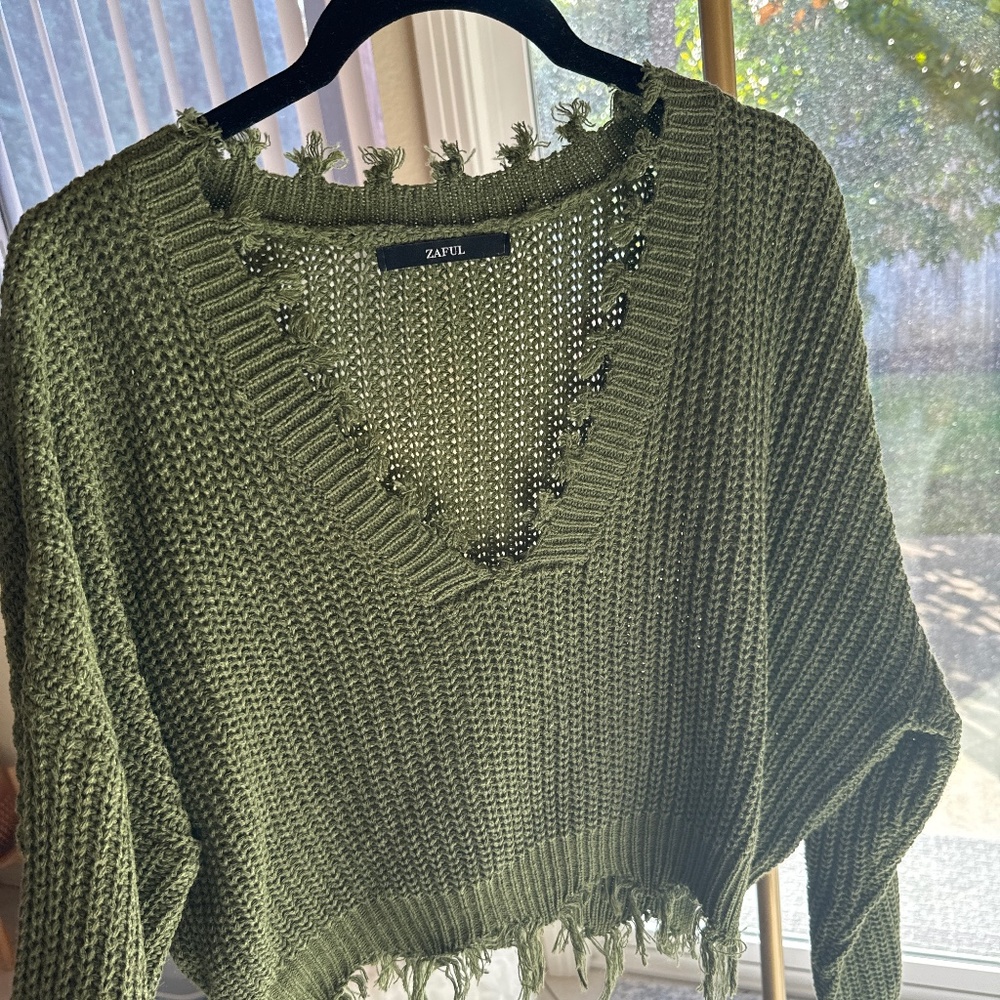 Green distressed cropped sweater